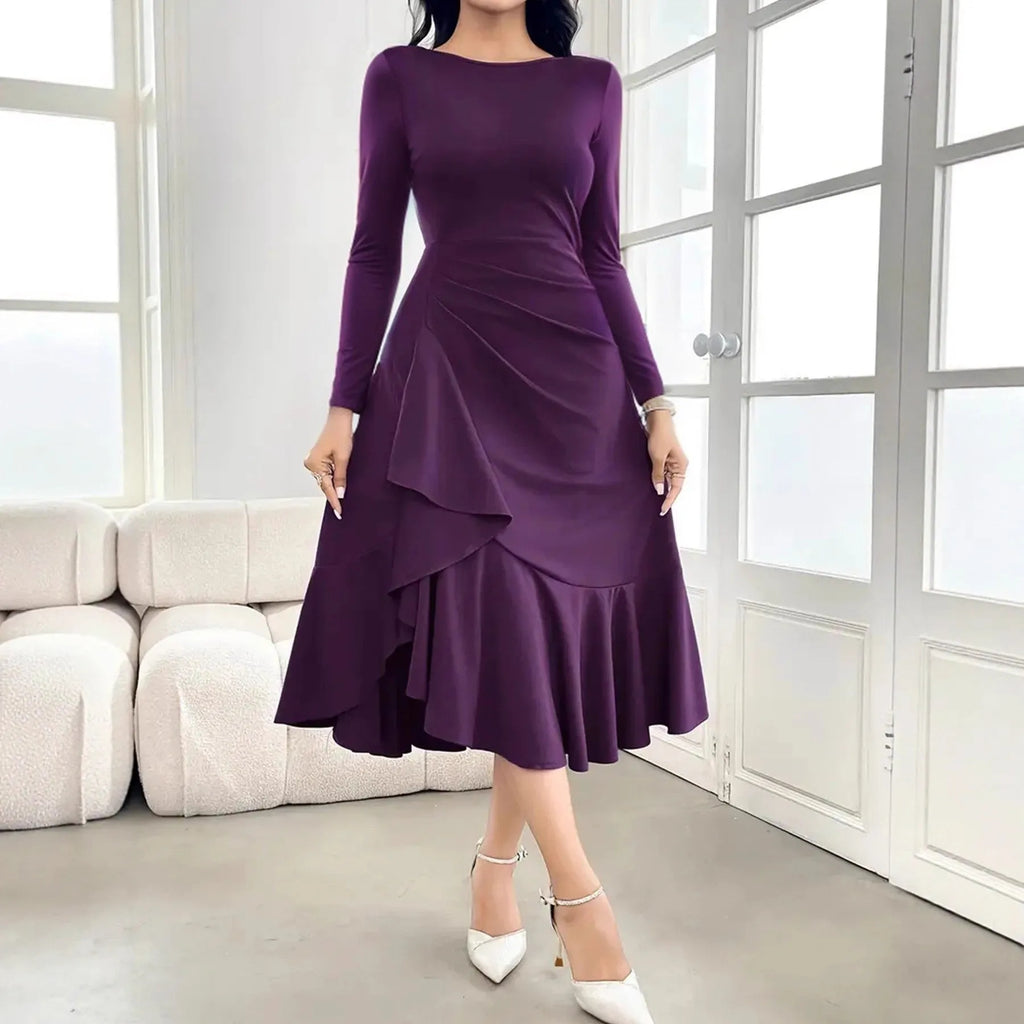 Purple women's long sleeve dress with round neck, ruffles, and a mid waist.
