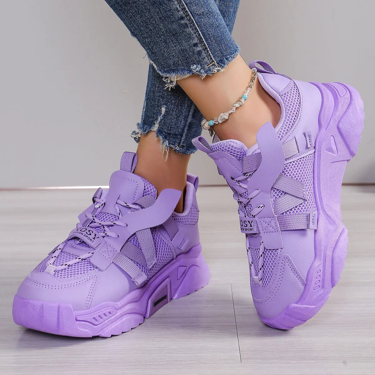 Women's purple platform mesh sports shoes with lace-up front and breathable construction