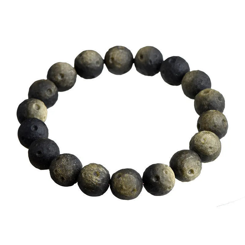 Natural obsidian crater ball bracelet with grinding finish in silver or golden meteorite colours with various bead sizes