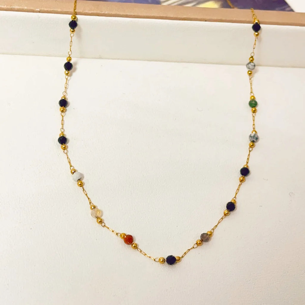 Women's gold titanium steel necklace with natural stone pendant on O-ring chain