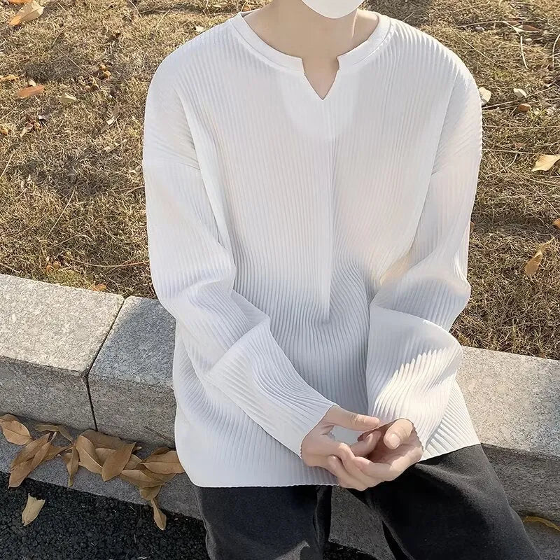 Plus size women's striped texture pullover top in loose fit with long sleeves