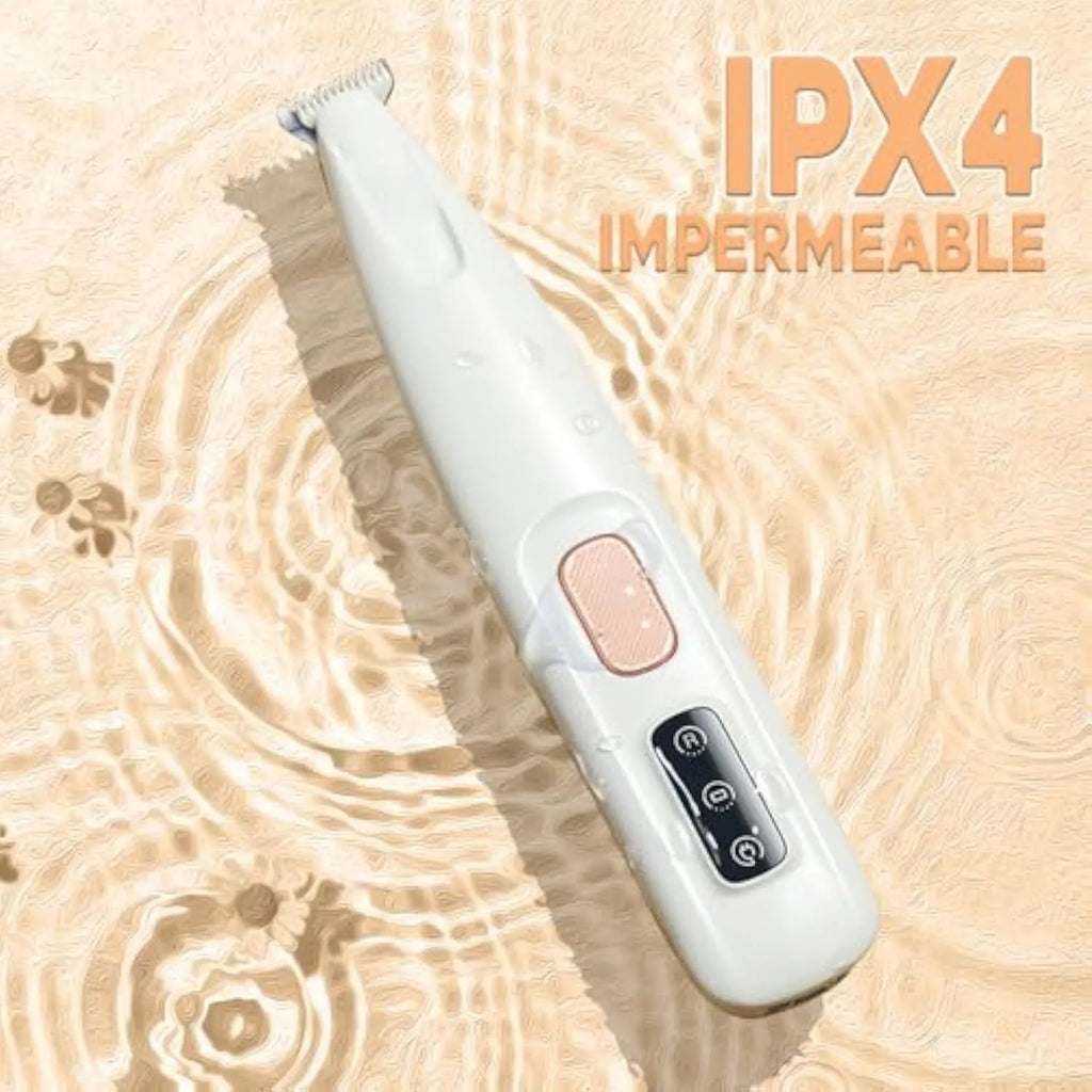 White rechargeable electric dog paw trimmer with LED light on a compact body.