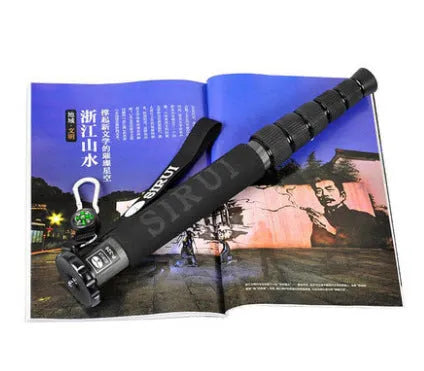Black carbon fibre SLR camera monopod extended to maximum 1540mm height