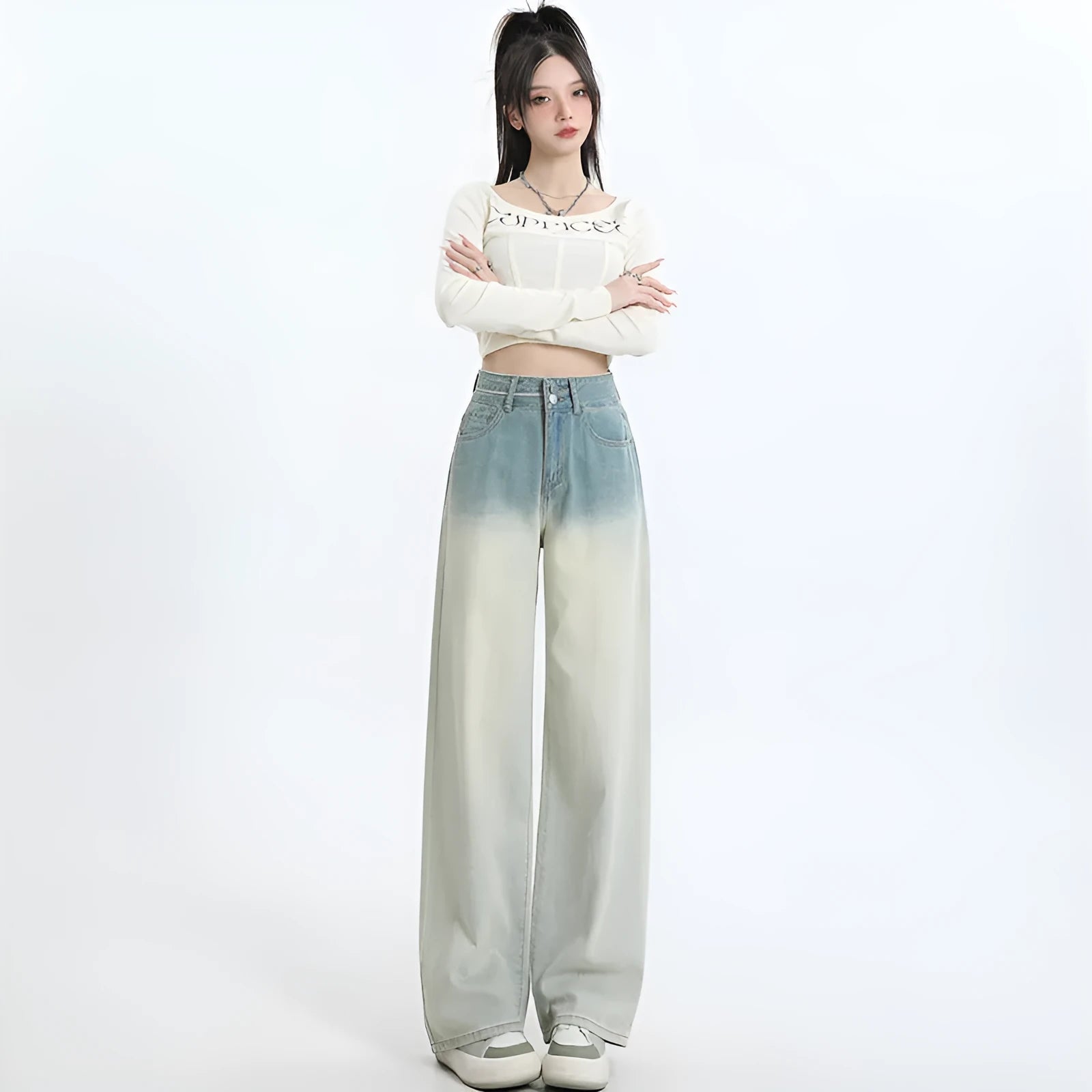 Women's straight-leg denim trousers in a gradient blue colour with a wide leg fit.