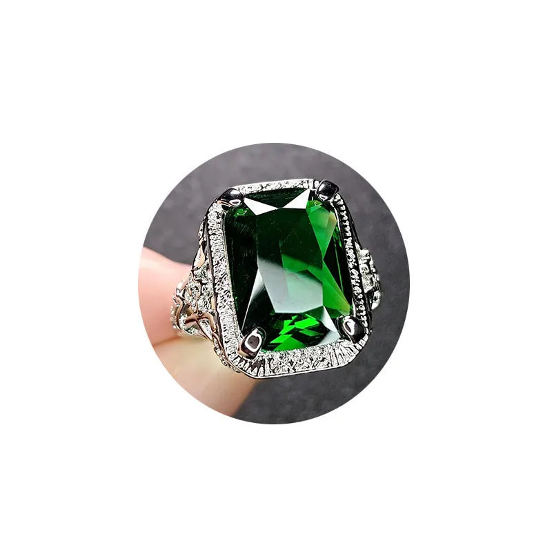Women's geometric ring with pigeons-blood ruby in adjustable platinum colours