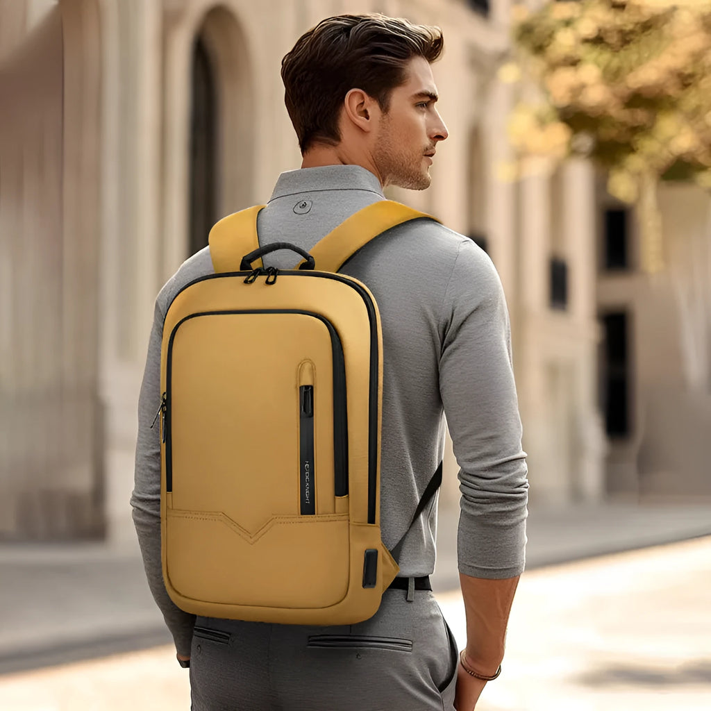 Lightweight polyester commuter backpack with USB interface available in 14 and 17 inch sizes in solid colours