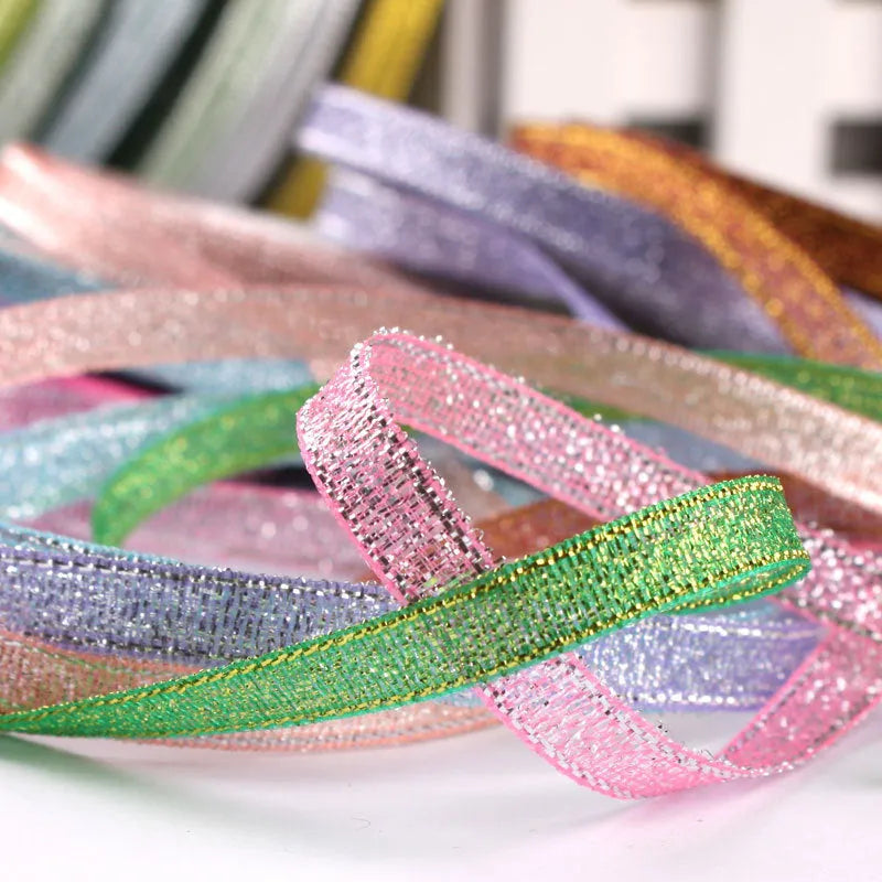 Roll of polyester gift packaging ribbon with 0.6cm width and 22 metre length in various colour options