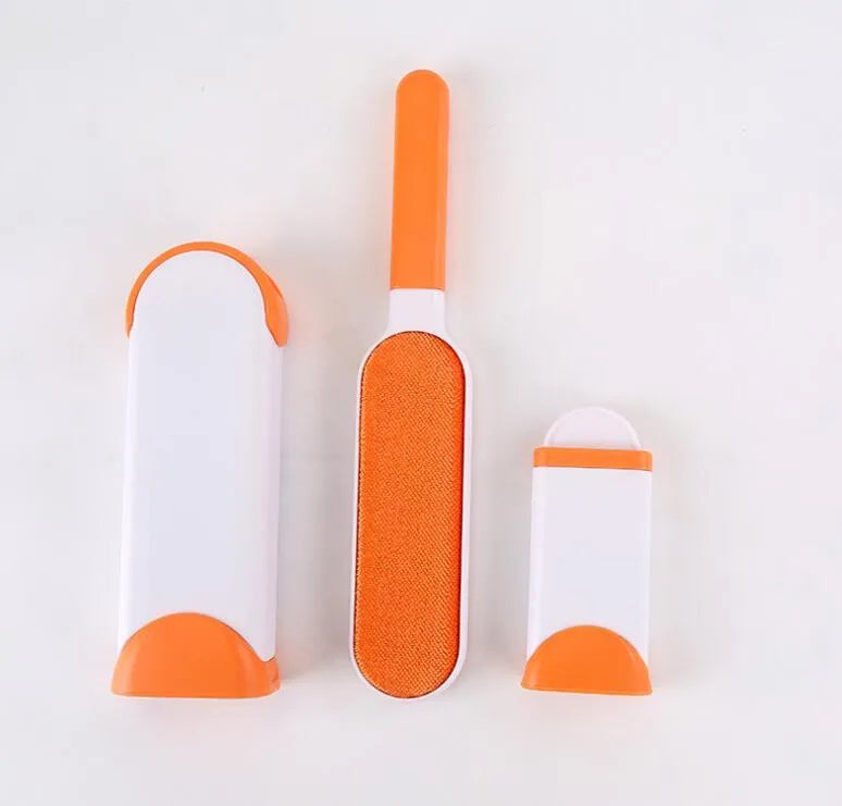 Blue reusable pet hair remover brush with self-cleaning base for removing fur from a grey sofa.