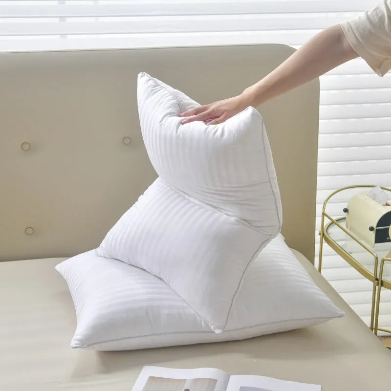 White hotel cotton satin stripe pillow with feather and cotton filling shown in three size options.