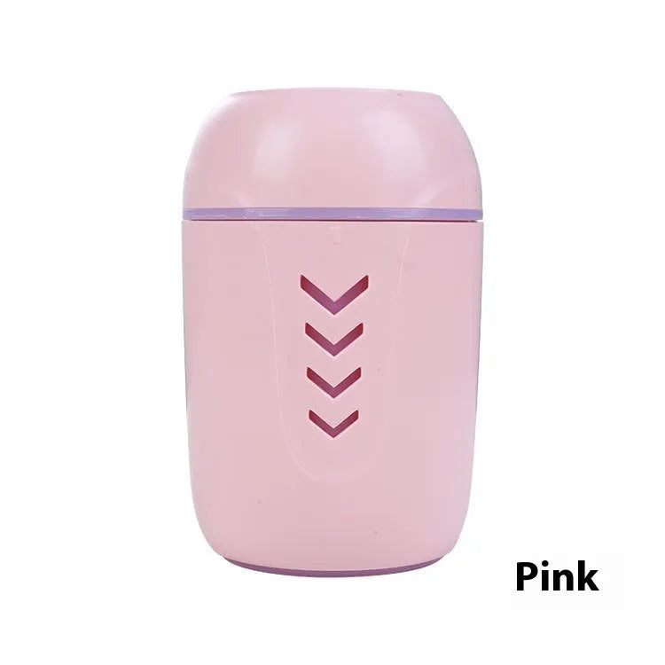 Compact round USB portable air purifier in blue, pink, or white for car and desktop use.
