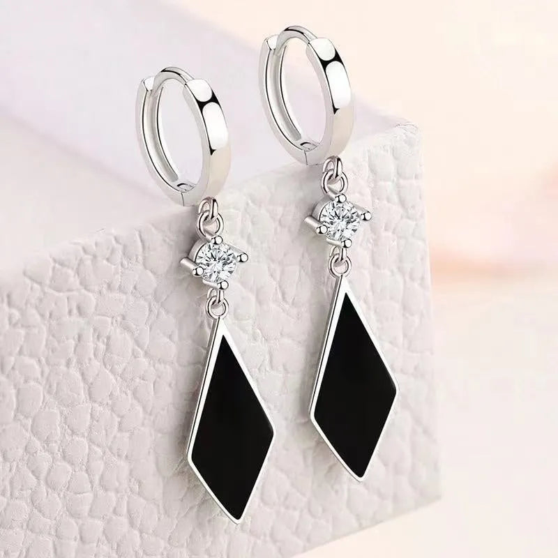 Silver-toned vintage diamond geometric earrings made from zinc alloy for women.