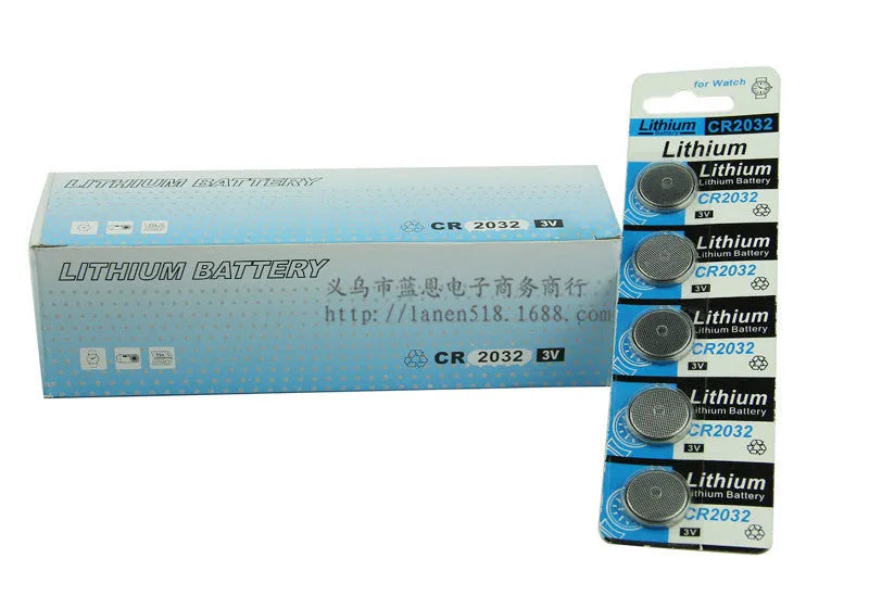 CR2032 3V lithium button battery on a card, showing its 20mm diameter and steel case.