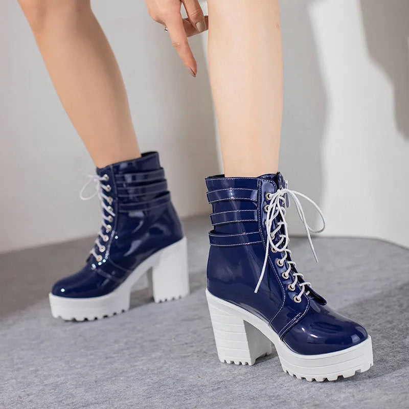 Women's black ankle boots with 6-8cm heel, waterproof platform, and front lace-up design