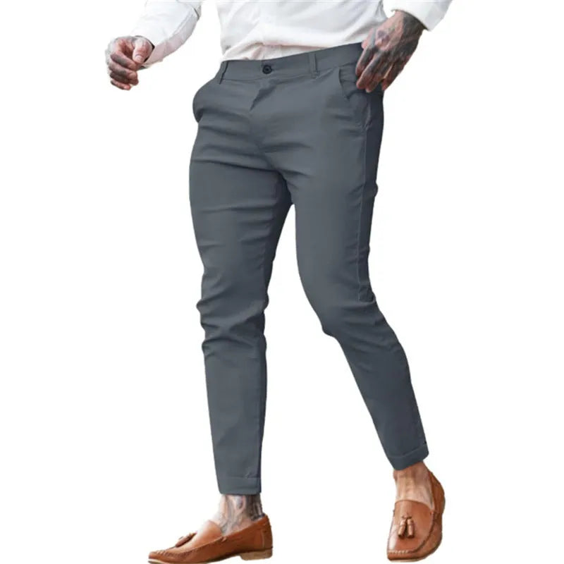 Men's slim fit pencil trousers in cotton twill fabric with stretch, showing zipper fly and mid-waist design