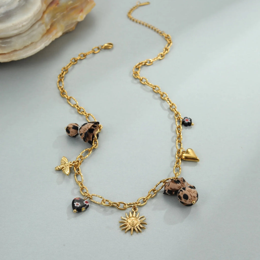 Gold-coloured stainless steel necklace with leopard pattern pendant on adjustable 41-50cm chain