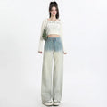 Women's straight-leg denim trousers in a gradient blue colour with a wide leg fit.