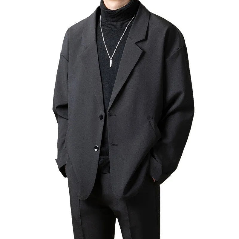 Men's loose fit casual suit jacket in light business style with regular length and long sleeves