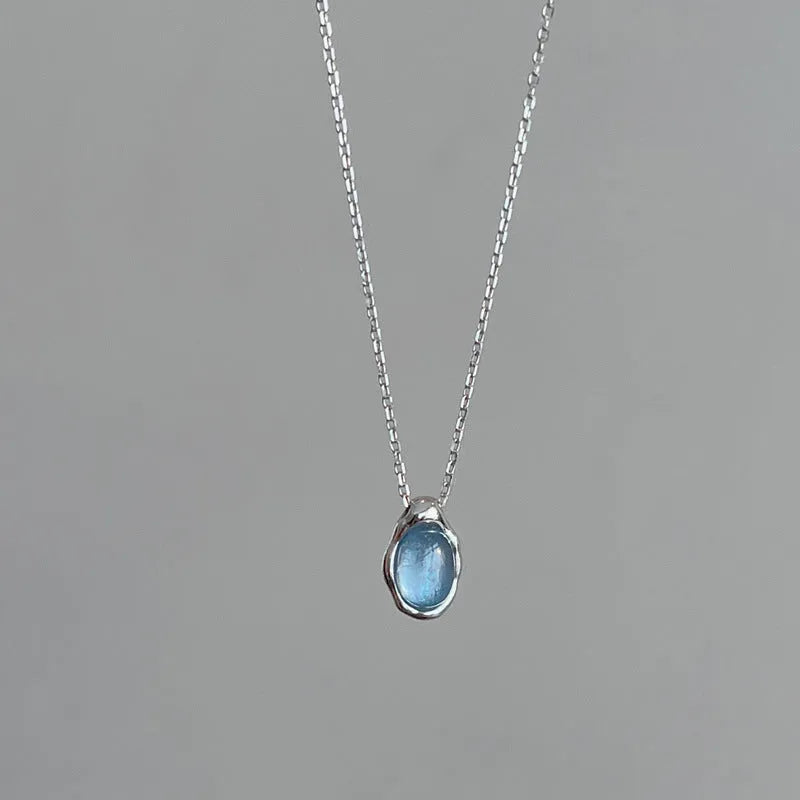 Navy blue water drop necklace with cross chain design in platinum colour, adjustable 41-50cm length