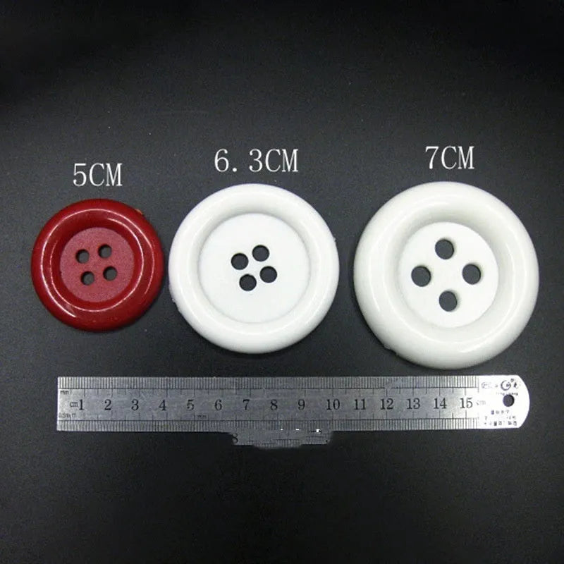 Oversized round edge plastic nylon sewing buttons with four holes in multiple colours