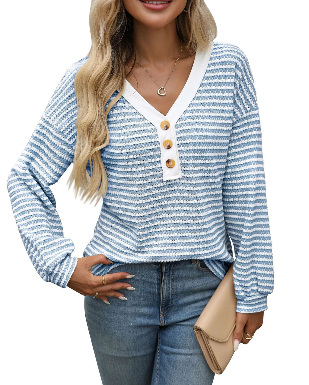 Women's loose V-neck pullover top with button front and patchwork style in various colours.