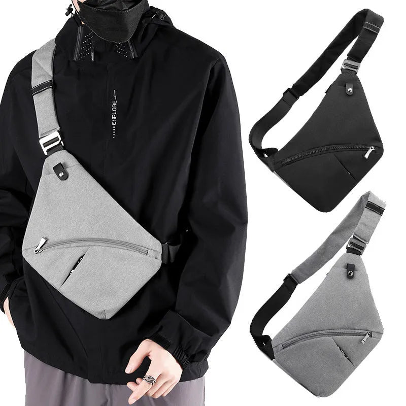 Black Oxford cloth men's chest bag with one shoulder strap and urban letter detail.