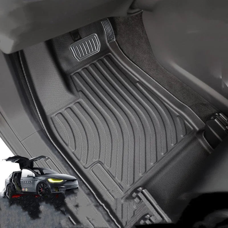 Tesla Model X black TPE rubber floor mats and tailgate boot liner set fitted in car.