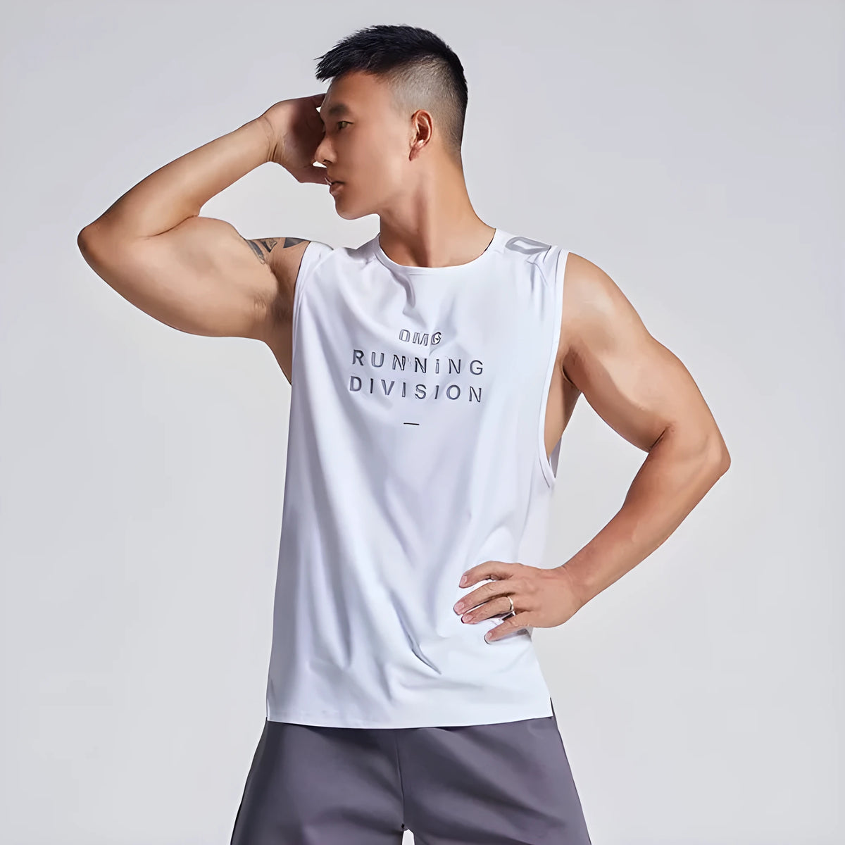 Men's lightweight mesh sports vest in blue colour on a hanger, showing loose fit and straight hem design.