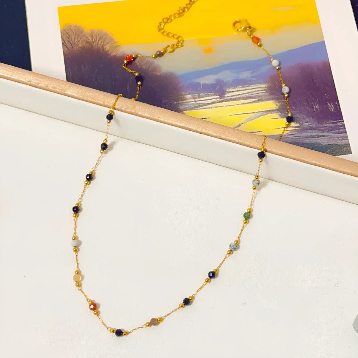 Women's gold titanium steel necklace with natural stone pendant on O-ring chain