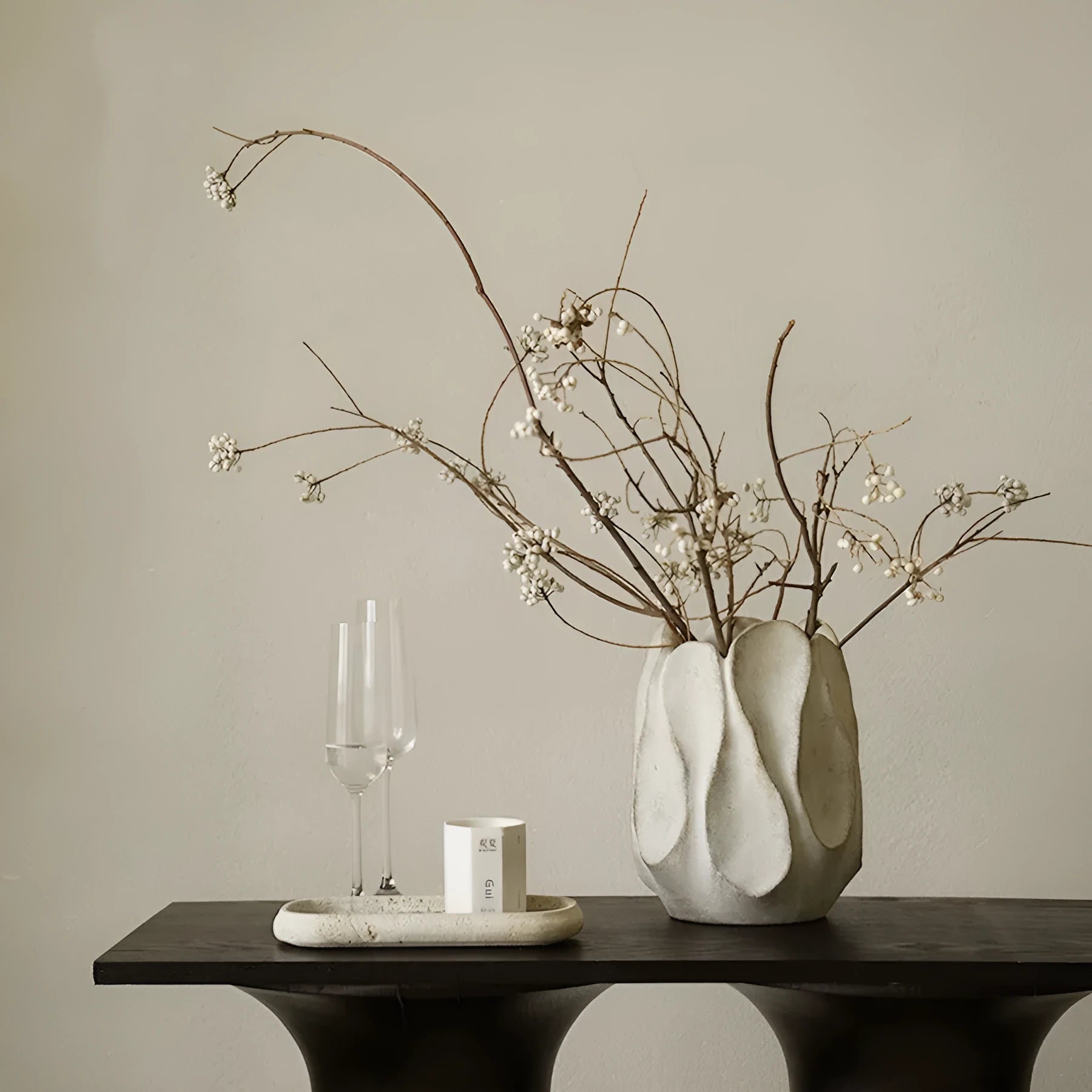 Irregular ceramic vase for flower arrangements in magnesium clay with natural textured finish