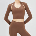 Men's cotton chino trousers in camel yellow displayed flat