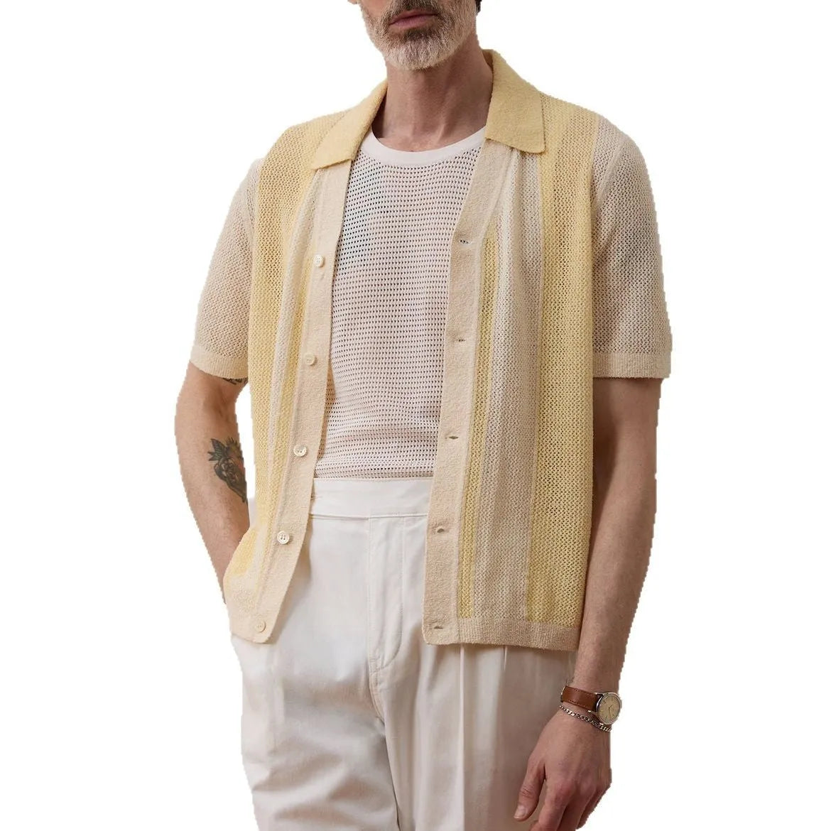 Yellow asymmetric hollow-out short-sleeved polo shirt on a hanger