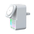 White and black 5-in-1 Bluetooth speaker wireless charger unit on a table