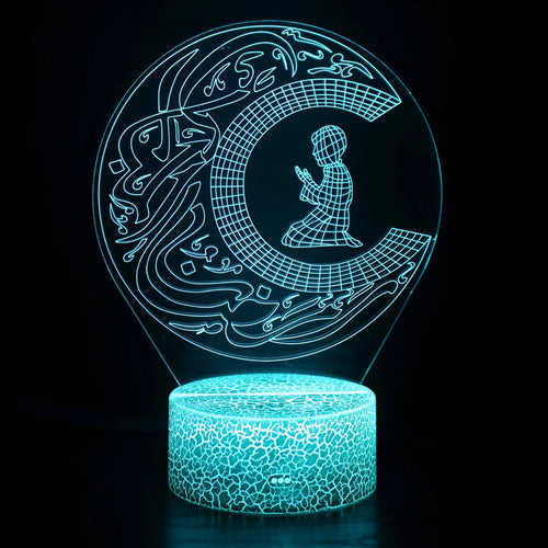 3D cartoon style small night lamp with black touch base and remote control showing colourful LED illumination