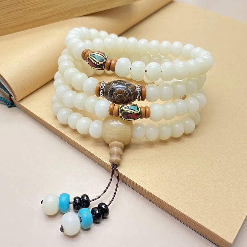 White jade bodhi bead bracelet with 108 beads, showing pattern and size options.