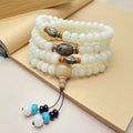 White jade bodhi bead bracelet with 108 beads, showing pattern and size options.
