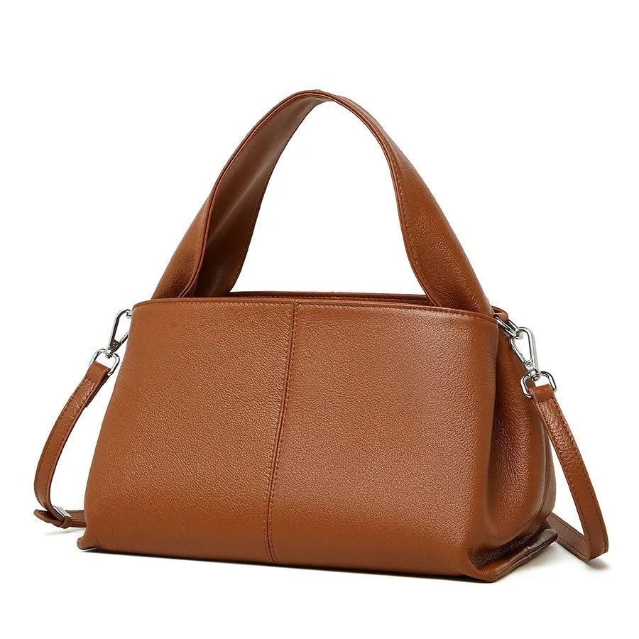 First layer cowhide messenger bag in horizontal square shape with double joint strap and retro texture in solid color