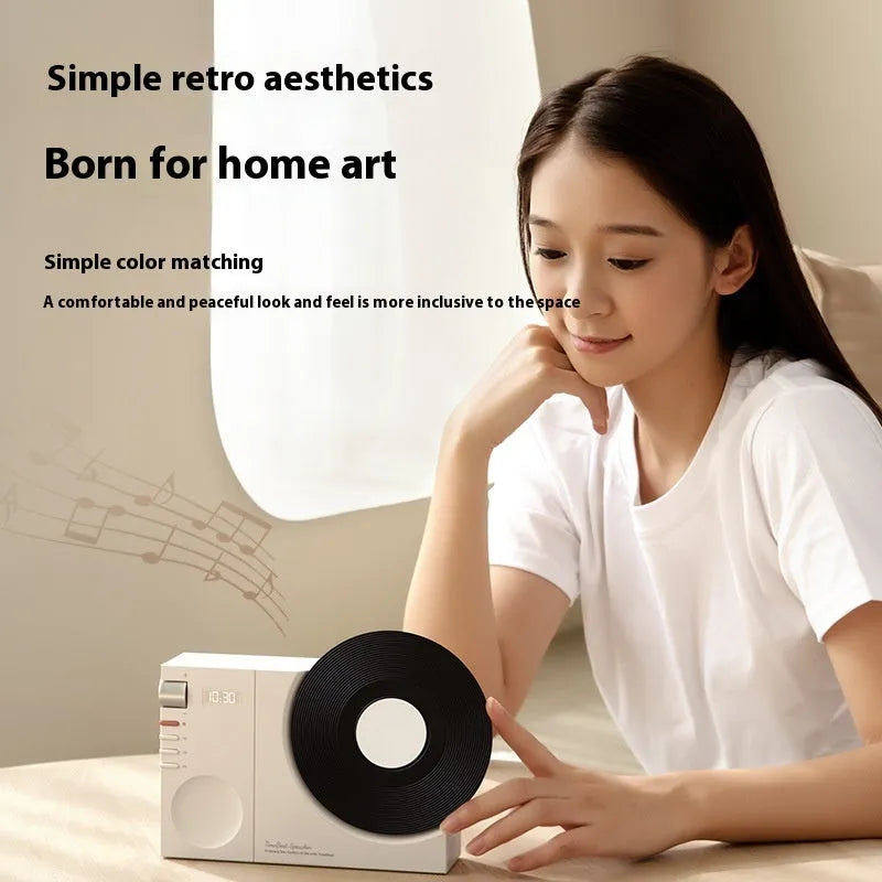 Mini Bluetooth speaker in Obsidian Black, Ivory White, Coral Pink or Plum Green colours with optional gift packaging