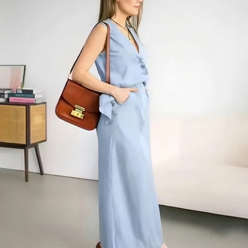 Women's white vest and long skirt two-piece casual suit set on hanger