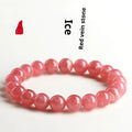 Women's geometric crystal bracelet with rhodochrosite pattern and a longevity lock charm.