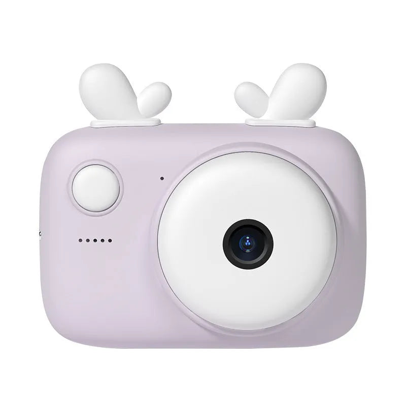 Green A2 kids digital camera with macaron-style SLR design and dual lenses on a table.