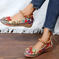 Women's black ethnic style platform sandals with cloth upper and elastic band, plus size range.