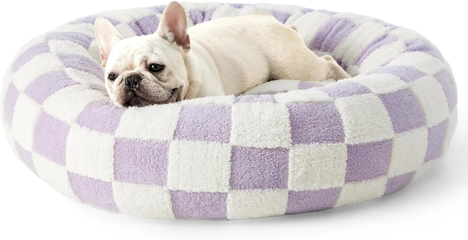 Round plastic dog bed with plaid cushion available in multiple colours and four size options