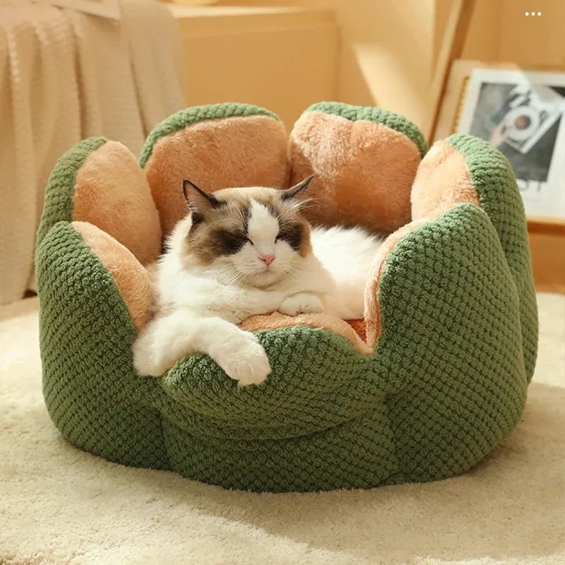 Green cactus petal shaped soft plush dog bed with a cave-like opening for cats and small dogs.