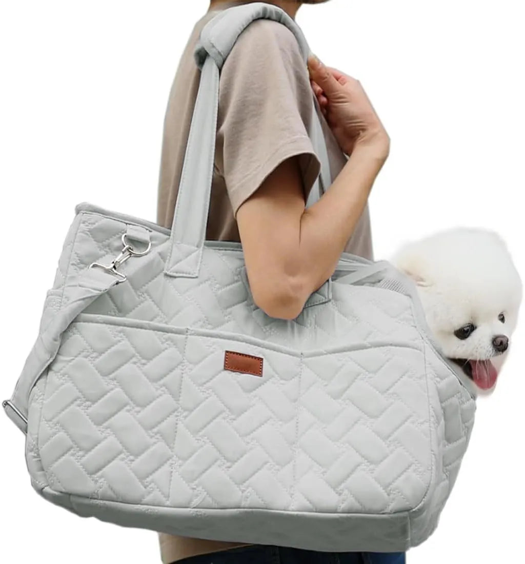 Grey pet carrier handbag with mesh panels and multiple pockets for cats or small dogs