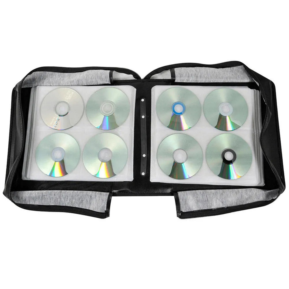 Black Oxford fabric CD DVD storage binder with a zipper and top carry strap, showing capacity for hundreds of discs.