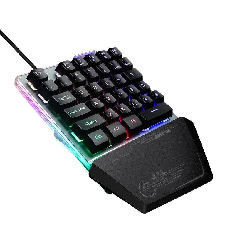 Black robotic one-handed gaming keyboard with RGB backlit keys and USB cable