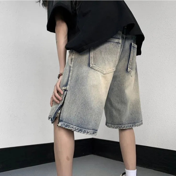 Blue retro tattered denim shorts with wide leg cut and loose fit for women