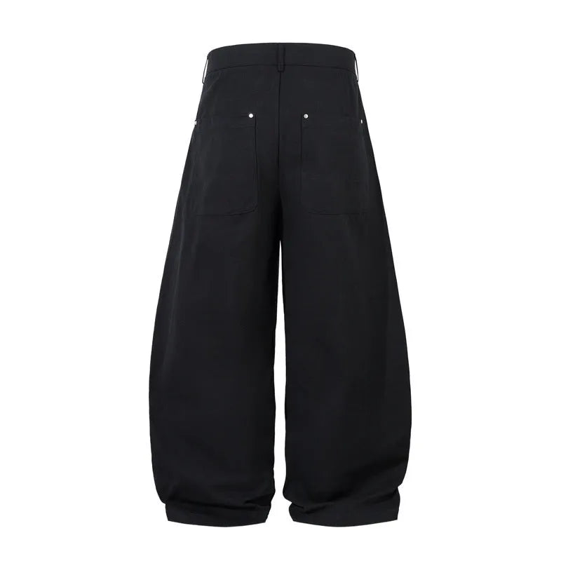 Men's black pleated machete casual trousers with loose-fitting wide-leg design and cotton construction
