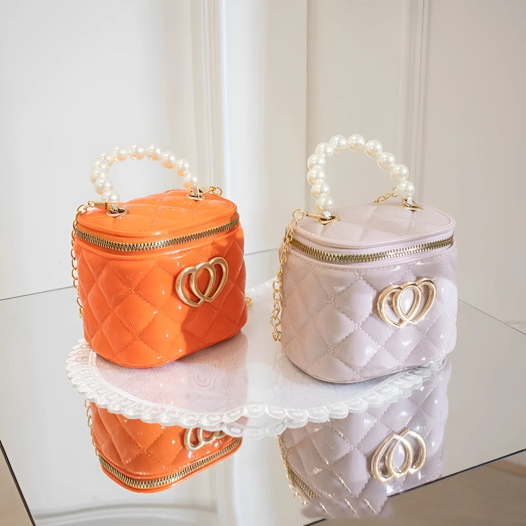 PVC bucket gel handbag with heart pattern in multiple colour options including apricot, black, green, orange, red, white and yellow