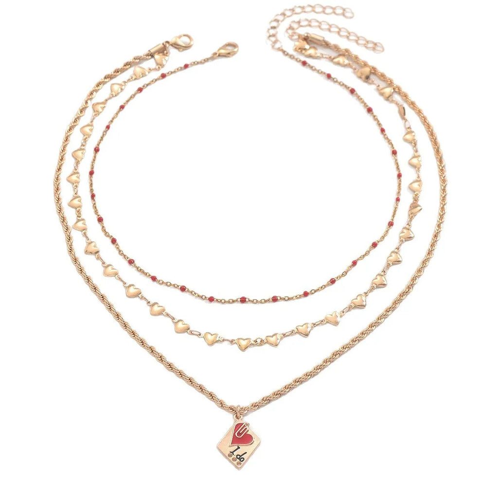 Close-up of a three-layer geometric love pendant on an adjustable zinc alloy clavicle chain.